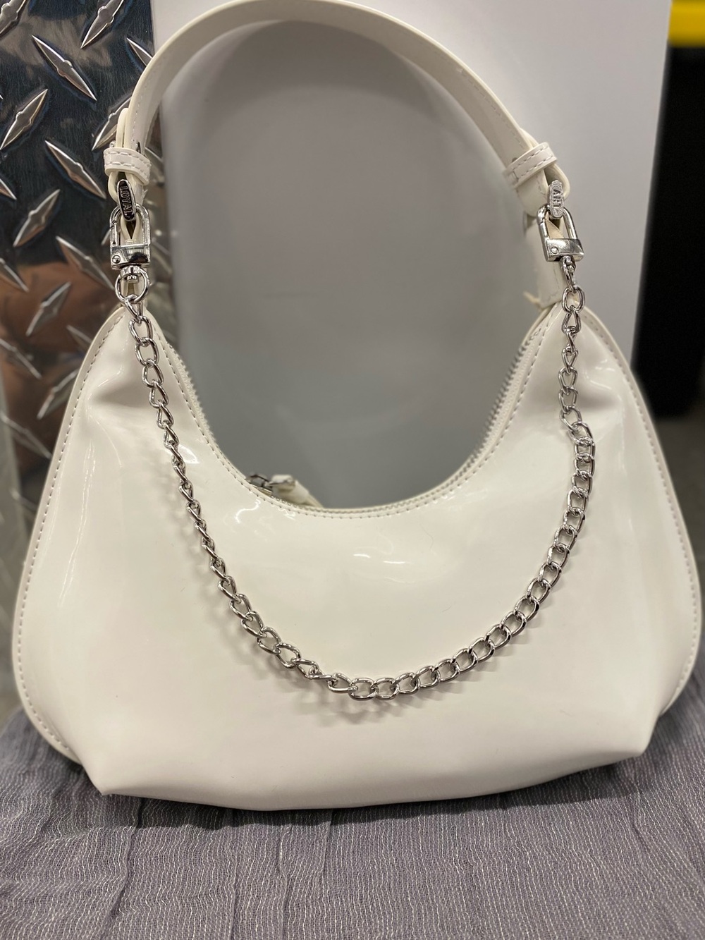 Elegant White Patent Hobo Bag with Chain Accent